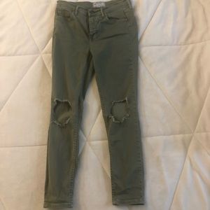Green high wasted Free People skinny jeans.